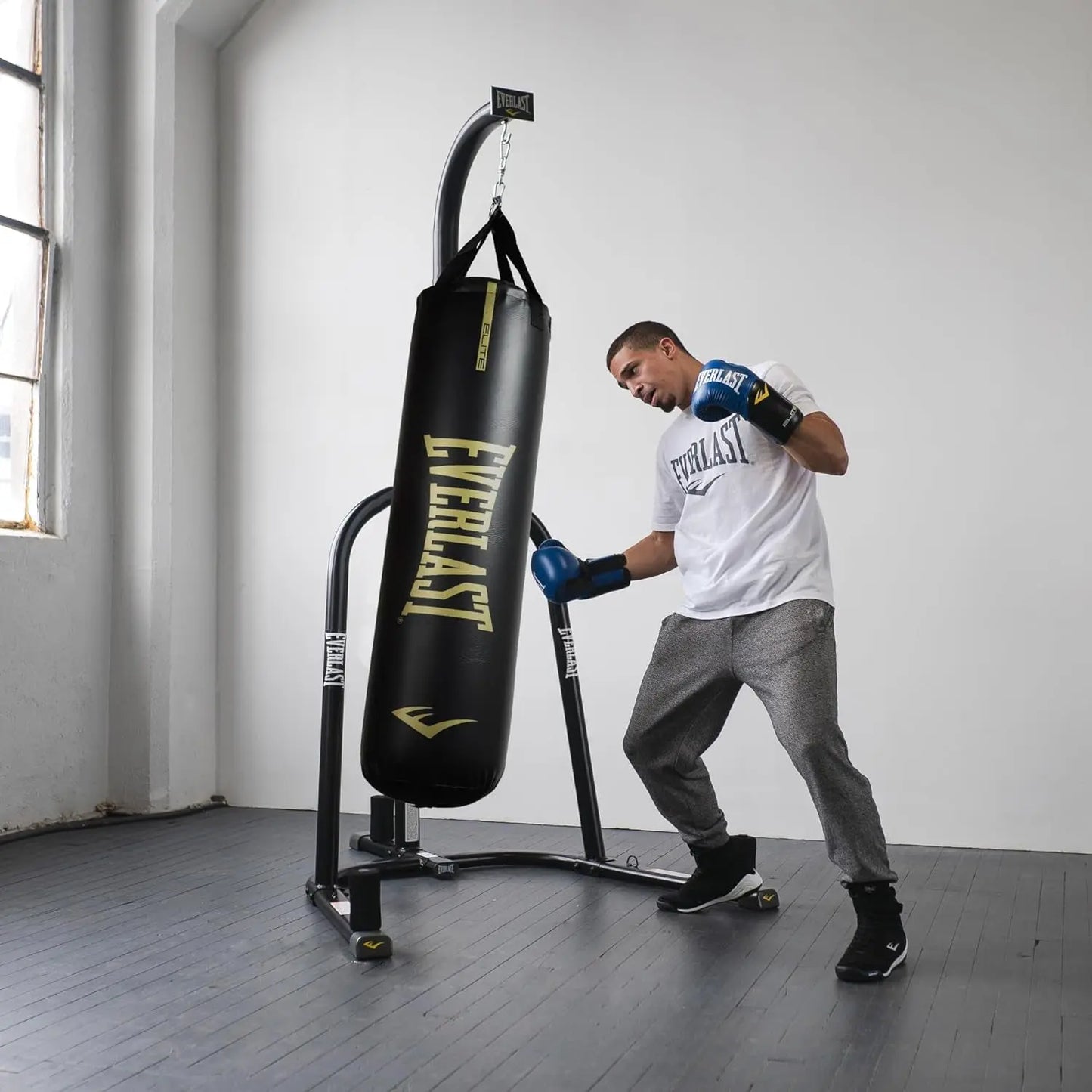 Elite Nevatear Heavy Bag - Dual-Hanging Strap System, Foam & Sand-Filled, Reinforced Straps - Ideal for Training, Boxing, Fight Sports, Fitness, Home Gym - 100LB - Black/Gold